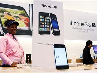 iPhone 3GS   -.  ©AFP