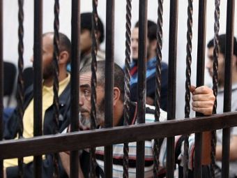 Сторонники Каддафи в зале суда. Фото ©AFP