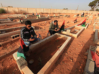 Похороны погибших в Ливии. Архивное фото Reuters