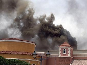 Пожар в Villagio Mall. Фото ©AP