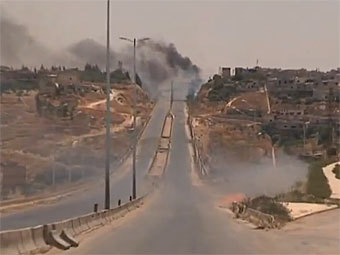 Кадр из видео, снятого наблюдателями ООН в Хомсе